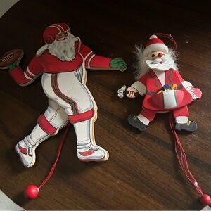 Two Vintage wooden Santa pull string Ornaments!